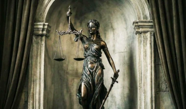 Lady Justice statue holding scales and swords